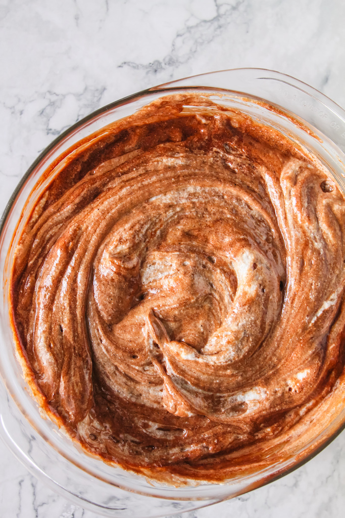 Folding the meringue into the chocolate batter