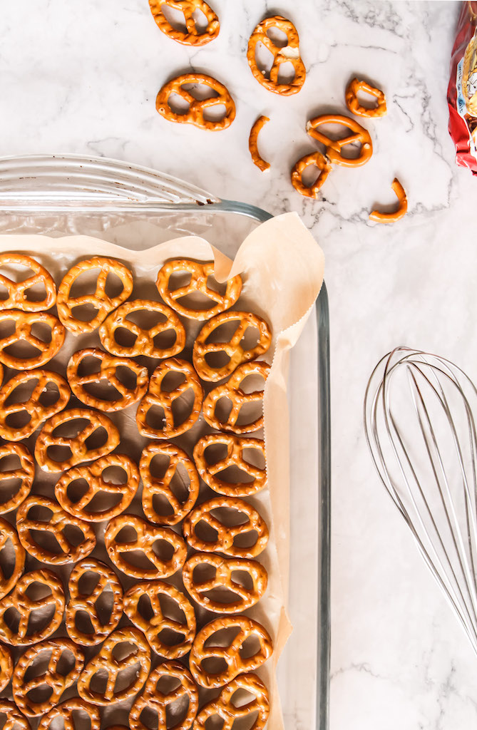 Salted Pretzels being placed into the pan